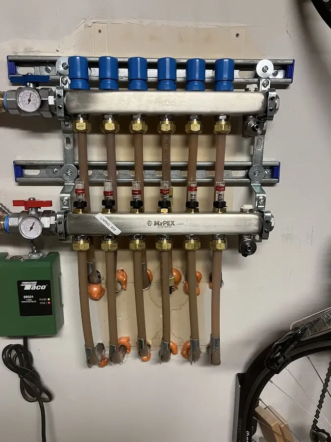 Plumber performing Water Heater Repair at a residential property in Plympton